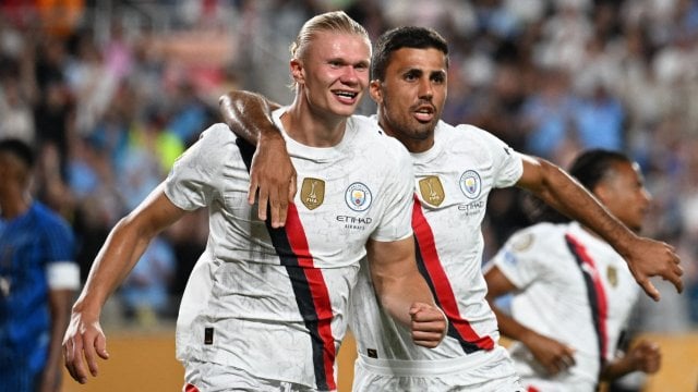 Erling Haaland y Rodri con el City