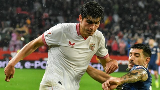 Juanlu con el Sevilla.