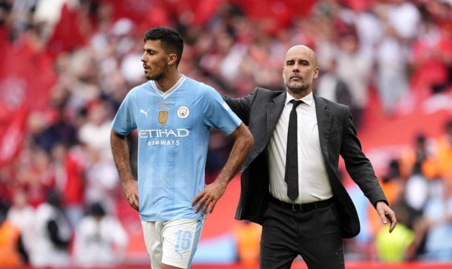 Rodri, consolado por Pep Guardiola