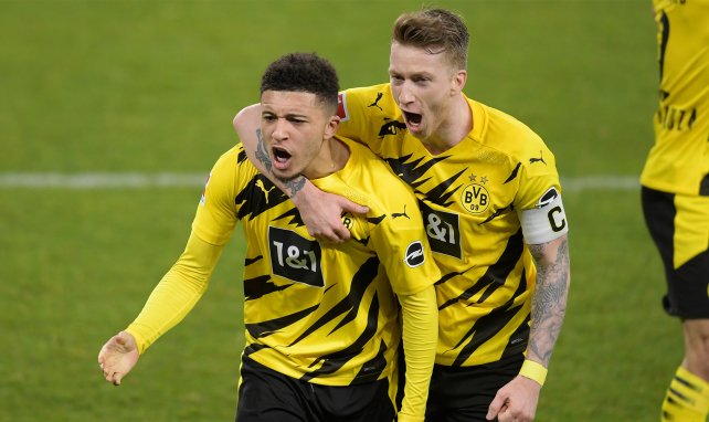 Jadon Sancho y Marco Reus celebran un gol